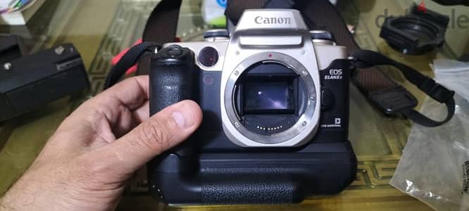 Canon EOS Elan II 35mm SLR Film Camera Body  with better grip canon