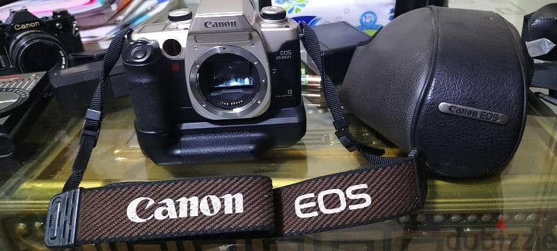 Canon EOS Elan II 35mm SLR Film Camera Body  with better grip canon 5