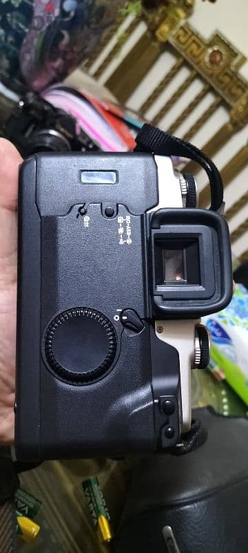 Canon EOS Elan II 35mm SLR Film Camera Body  with better grip canon 6