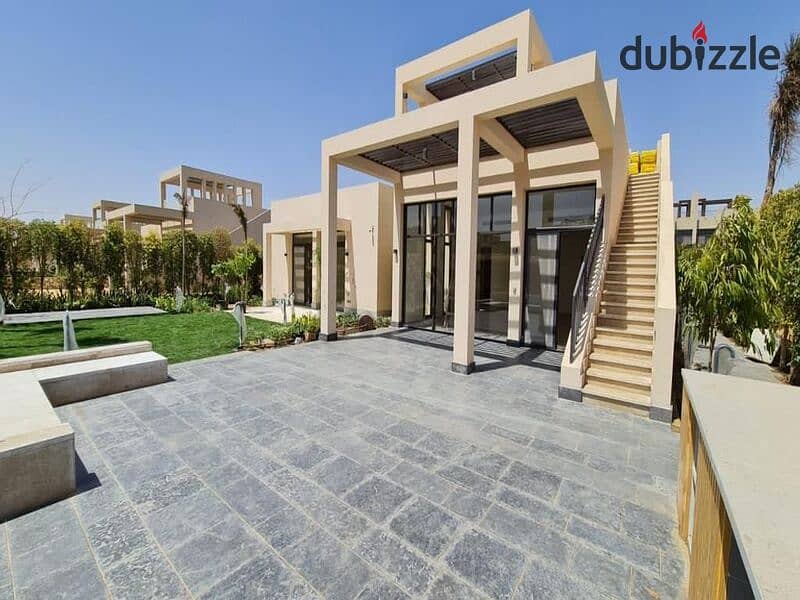 Townhouse for sale, installments over 9 years, directly on the plates, in front of Mall of Egypt OWEST 2