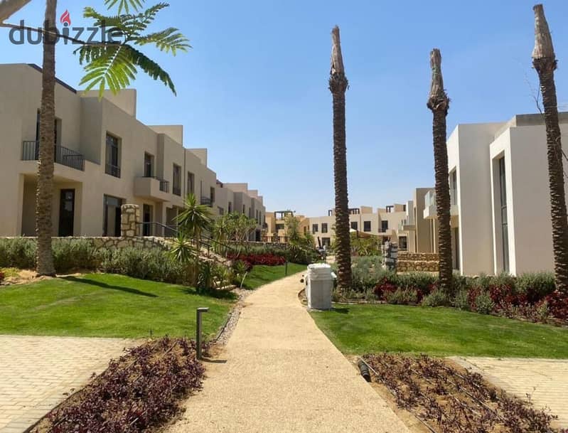 Townhouse for sale, installments over 9 years, directly on the plates, in front of Mall of Egypt OWEST 3