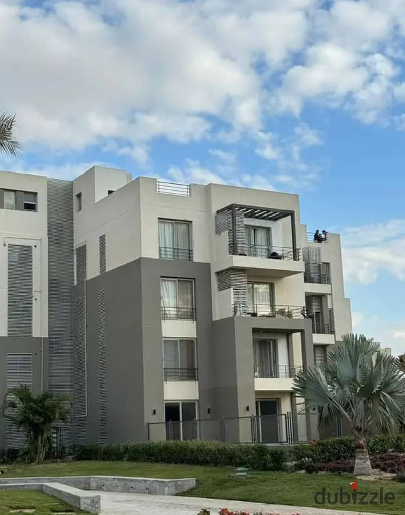 Apartment in a garden, fully finished, in Palm Hills compound, Palm Parks, in front of Arkan Plaza, available for installment payment. 10