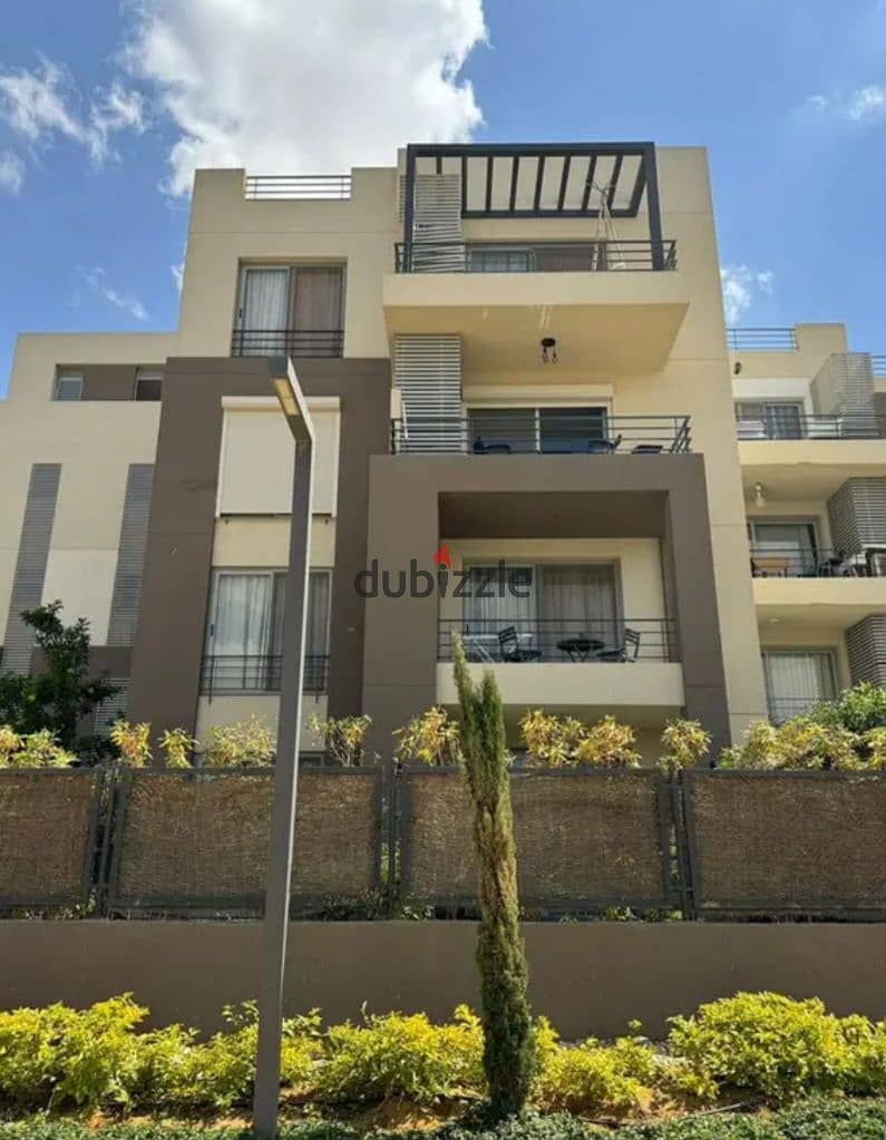 Apartment in a garden, fully finished, in Palm Hills compound, Palm Parks, in front of Arkan Plaza, available for installment payment. 11