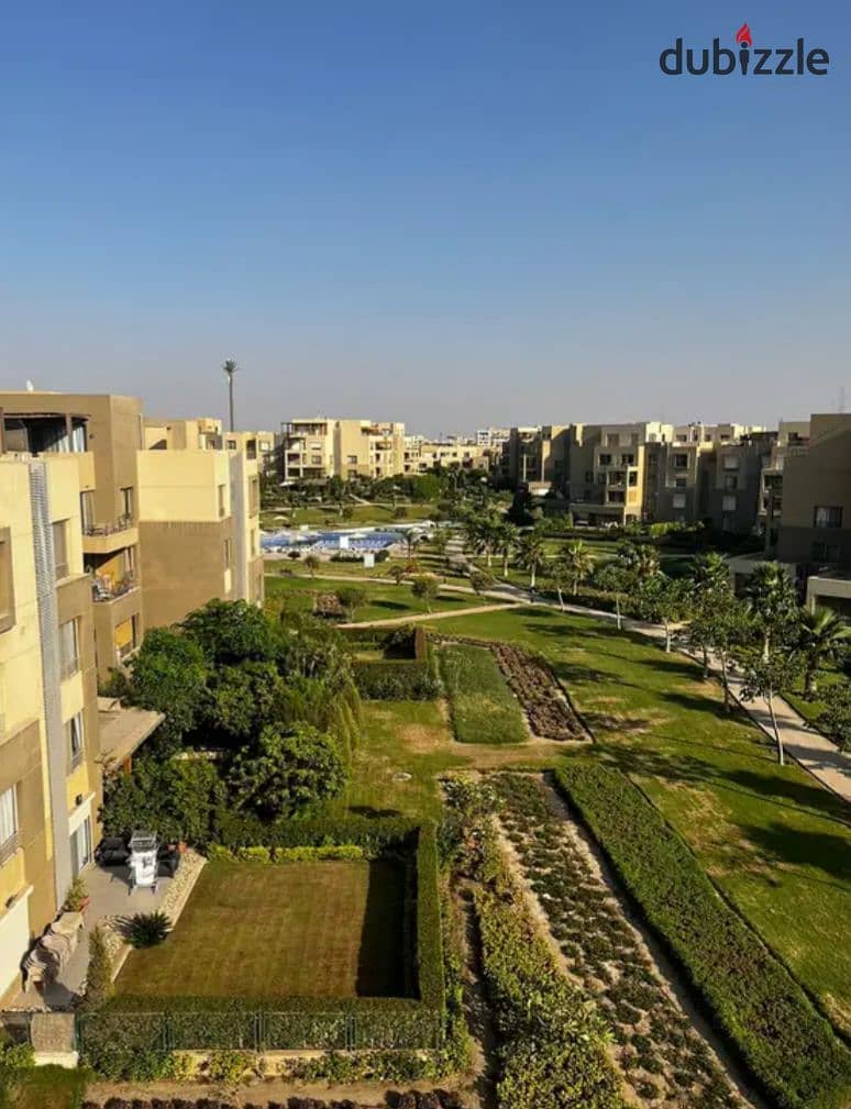 Apartment in a garden, fully finished, in Palm Hills compound, Palm Parks, in front of Arkan Plaza, available for installment payment. 12