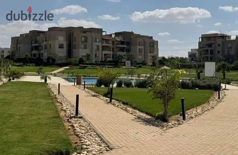 Apartment in a garden, fully finished, in Palm Hills compound, Palm Parks, in front of Arkan Plaza, available for installment payment. 13