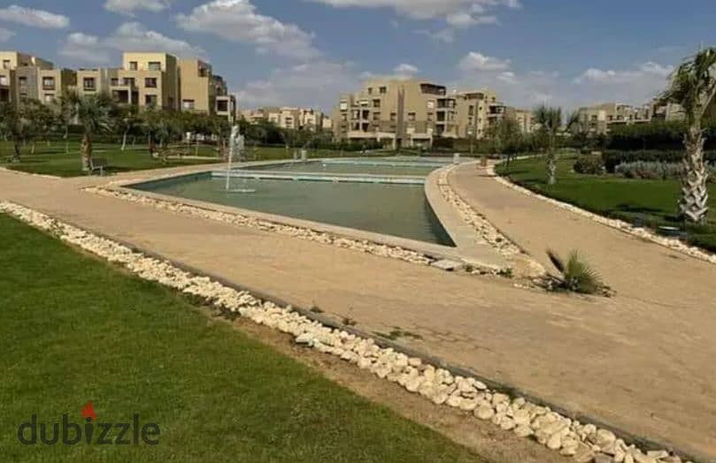 Apartment in a garden, fully finished, in Palm Hills compound, Palm Parks, in front of Arkan Plaza, available for installment payment. 14