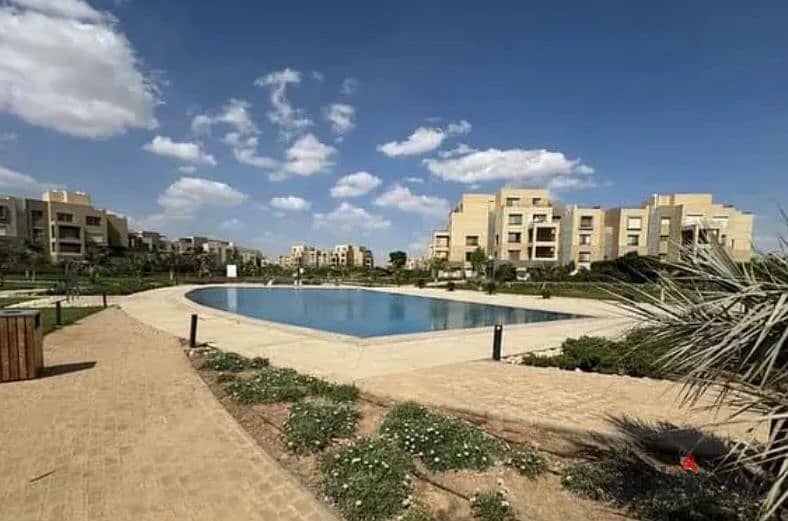 Apartment in a garden, fully finished, in Palm Hills compound, Palm Parks, in front of Arkan Plaza, available for installment payment. 15