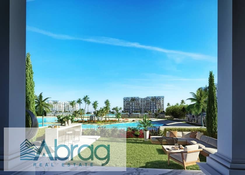 For sale, the largest area, a 3-bedroom apartment, directly on the lagoon, in iCity, El Tagamoa, with installments over 8 years 14