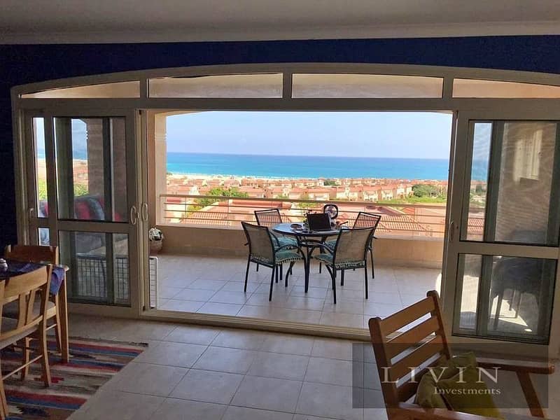 Two-bedroom chalet with large spaces, panoramic sea view, close to the clubhouse, with installments over the longest payment period in Telal Sokhna 1