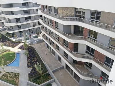 Apartment for sale with a private garden in installments in a very special location on the landscape in Mostakbal City, Bloomfields Compound, Emdad, F