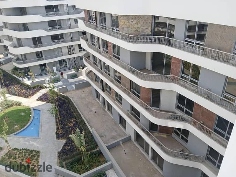 Apartment for sale with a private garden in installments in a very special location on the landscape in Mostakbal City, Bloomfields Compound, Imdad, F 7