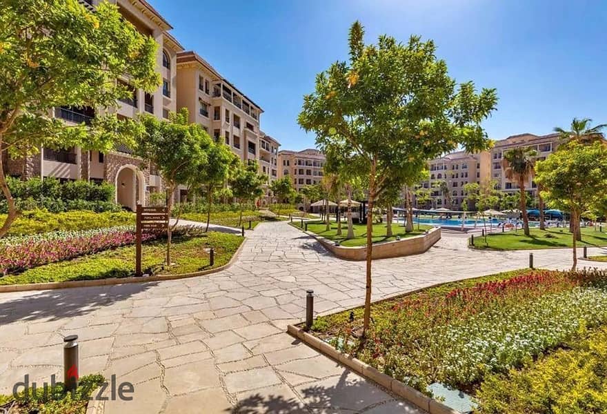 Apartment for sale in installments, fully finished, with a private garden, in a very special location in the Ninety Avenue Compound, Fifth Settlement 8