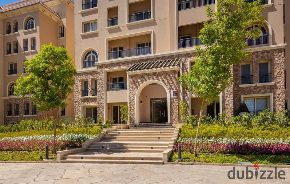 Apartment for sale in installments, fully finished, with a private garden, in a very special location in the Ninety Avenue Compound, Fifth Settlement 9