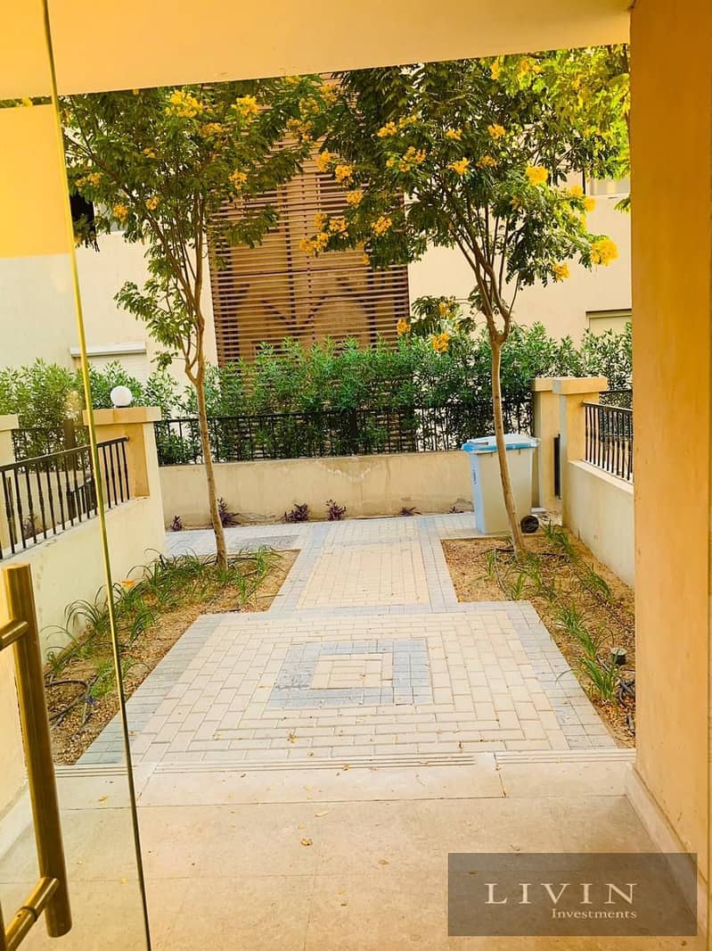 42% discount ground + garden apartment 3 bedrooms for sale in sarai new cairo compound Fifth Settlement wall by wall with madinaty + long installments 10