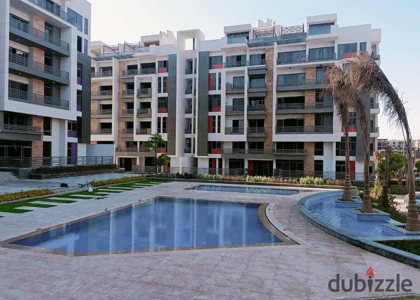 Two bedroom apartment for sale in front of Dar Misr Fifth Settlement 8