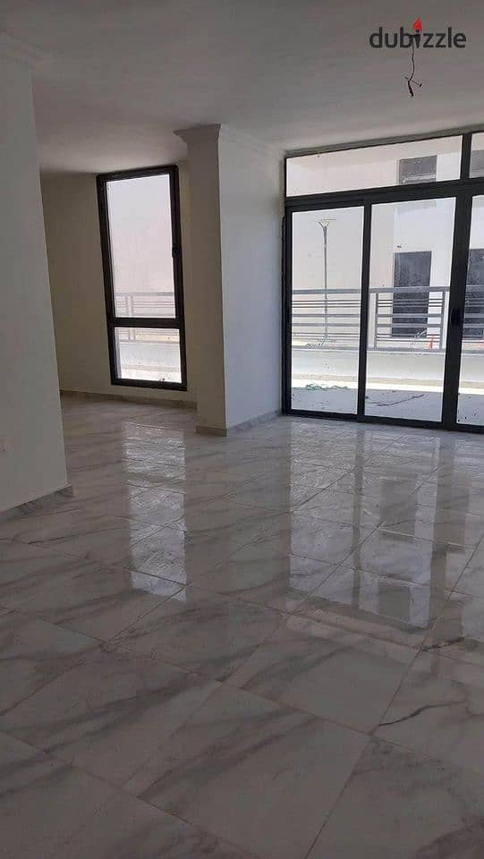 Apartment for sale in front of Dar Misr, Fifth Settlement, landscape view and swimming pools 6