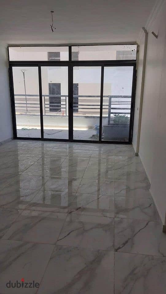 Apartment for sale in front of Dar Misr, Fifth Settlement, landscape view and swimming pools 7