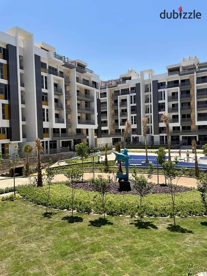 Apartment for sale in front of Dar Misr, Fifth Settlement, landscape view and swimming pools 9