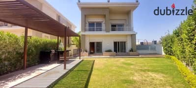 Super deluxe villa for rent, semi-furnished, with a garden, in Cairo Festival City 0