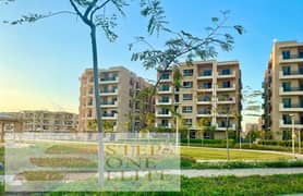 Apartment with open garden view for sale in installments in (Taj City Compound) 0