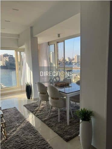 Direct view of the Nile Tower, an immediate apartment, fully finished with furniture and appliances, in Reef du Nile, next to Hilton Maadi 5