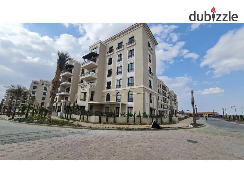 Apartment for sale, immediate receipt, fully finished, with air conditioners, in Village West Compound in the heart of Sheikh Zayed 1