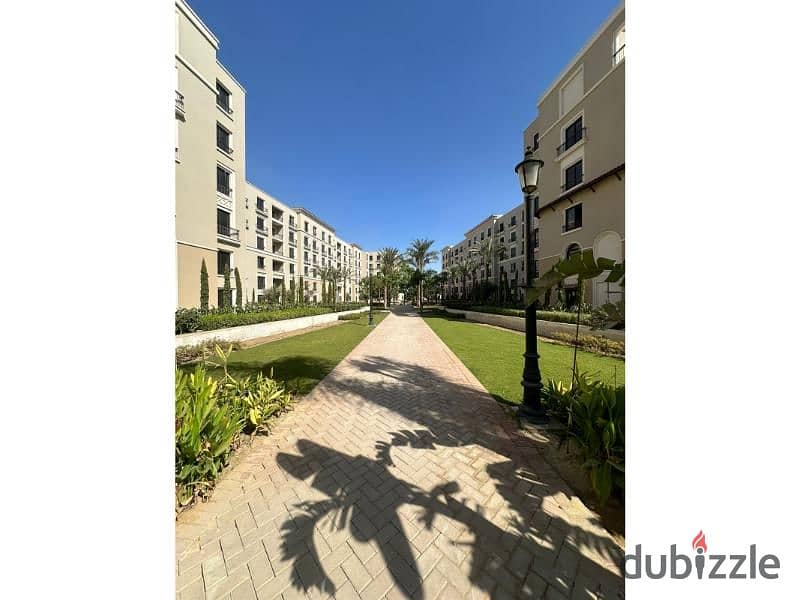 Apartment for sale, immediate receipt, fully finished, with air conditioners, in Village West Compound in the heart of Sheikh Zayed 4