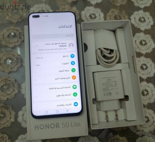 هونر 50 لايت lite بحالة الجديد بيلمع بمشتملاتة رامات 8 ذاكرة 128 3