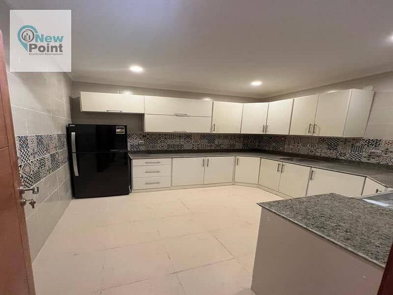 For sale, a fully finished two-bedroom apartment in a ready-to-move-in compound in New Capital 3