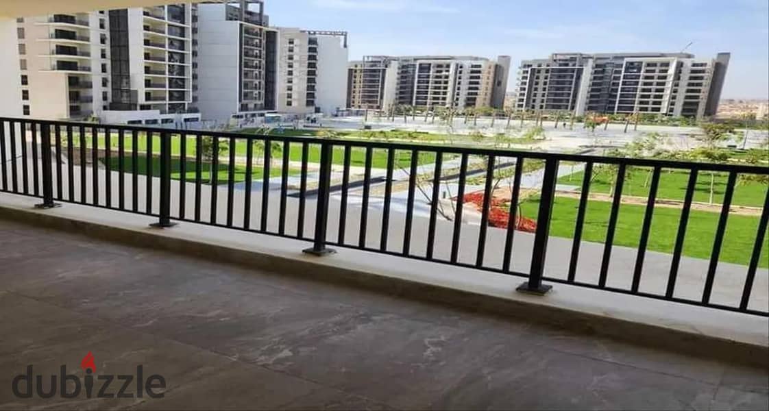 Apartment for sale in Zed West New Cairo project, 5% down payment and interest-free installments 12