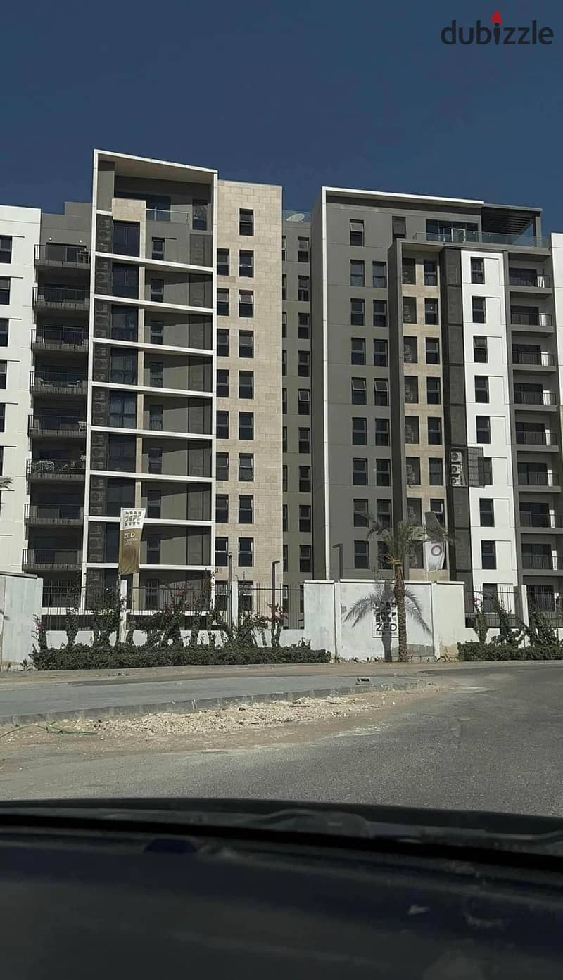 Apartment for sale in Zed West New Cairo project, 5% down payment and interest-free installments 15