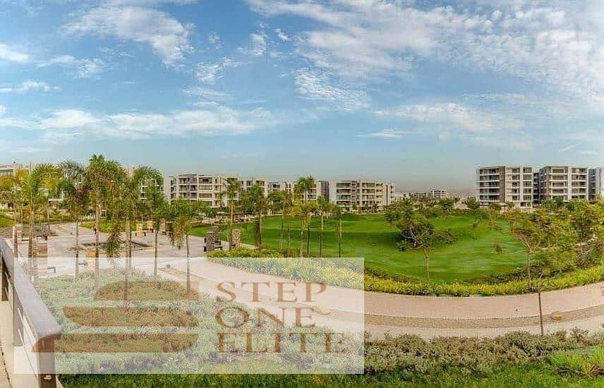 For sale, ground floor apartment with garden on Suez Road in front of JW Marriott New Cairo - Taj City Compound 4