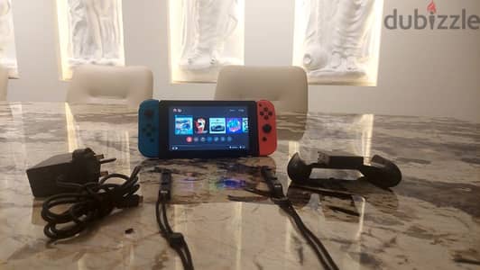 128GB UK Nintendo Switch + 2 Purchased Games