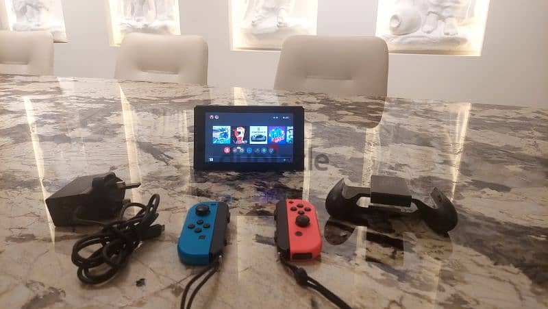 128GB UK Nintendo Switch + 2 Purchased Games 1