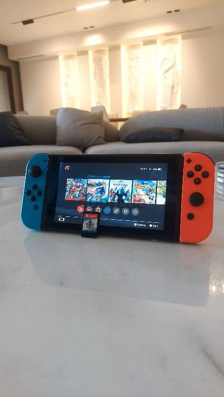 128GB UK Nintendo Switch + 2 Purchased Games 2