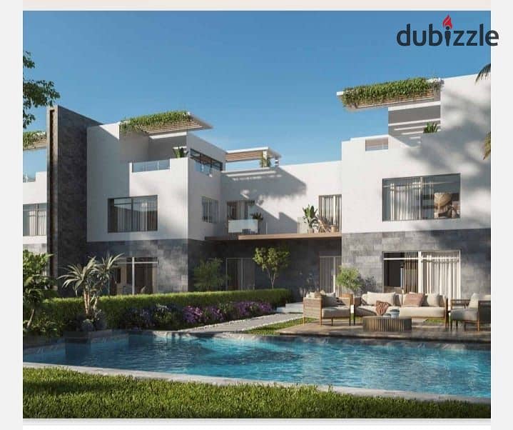 town house for sale with swimming pool lagoon view sheikh zayed in dunes in installments over 8 years 0