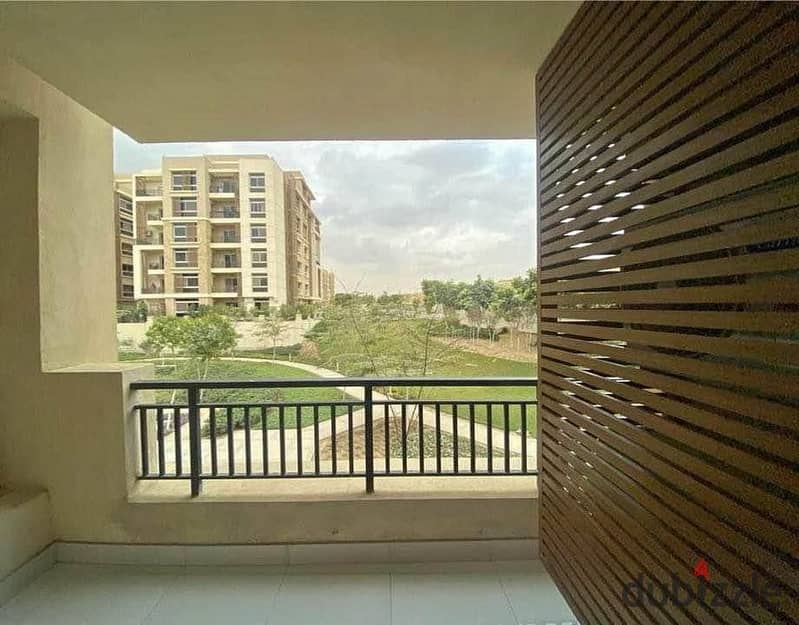 Apartment for sale in New Cairo, in a compound in front of Cairo Airport 1