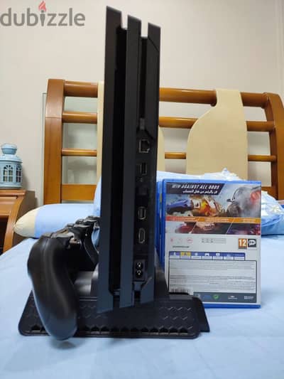 PS4 PRO 4K 60 HZ WITH 2 CONSOLES AND 3 GAMES