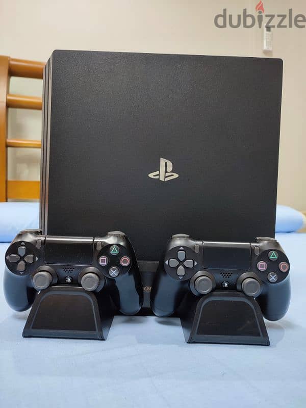 PS4 PRO 4K 60 HZ WITH 2 CONSOLES AND 3 GAMES 1