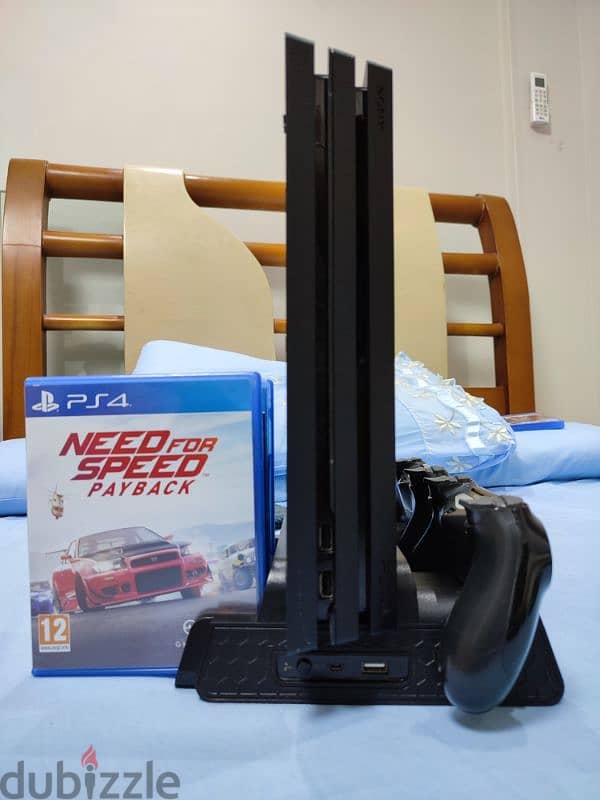 PS4 PRO 4K 60 HZ WITH 2 CONSOLES AND 3 GAMES 2