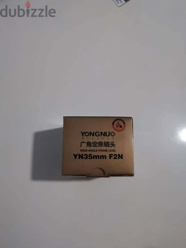 عدسة yongnuo 35mm lens for nikon 11