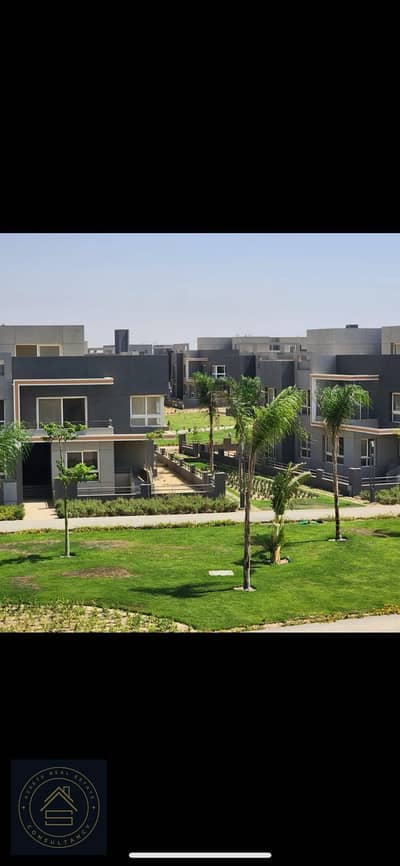 للبيع بنهاوس (RESALE) في كومباوند Kayan - بدر الدين في كومباوند Grand Heights بالقرب من جميع المحاور الرئيسئة