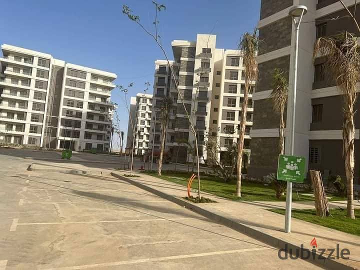 An apartment for sale with studio price at Noor city , with the old price , with longest installmenta period , open view over the villas area . 7