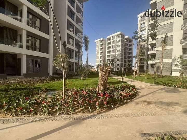 An apartment for sale with studio price at Noor city , with the old price , with longest installmenta period , open view over the villas area . 9