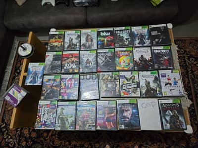 Xbox arcade 360 with white controller and a lot of games CDs