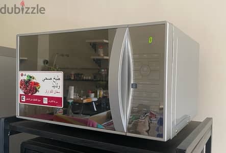 ميكروويف ال جي بسخان شواية كوارتز سعة 30 لتر "1,300 وات" lg microwave