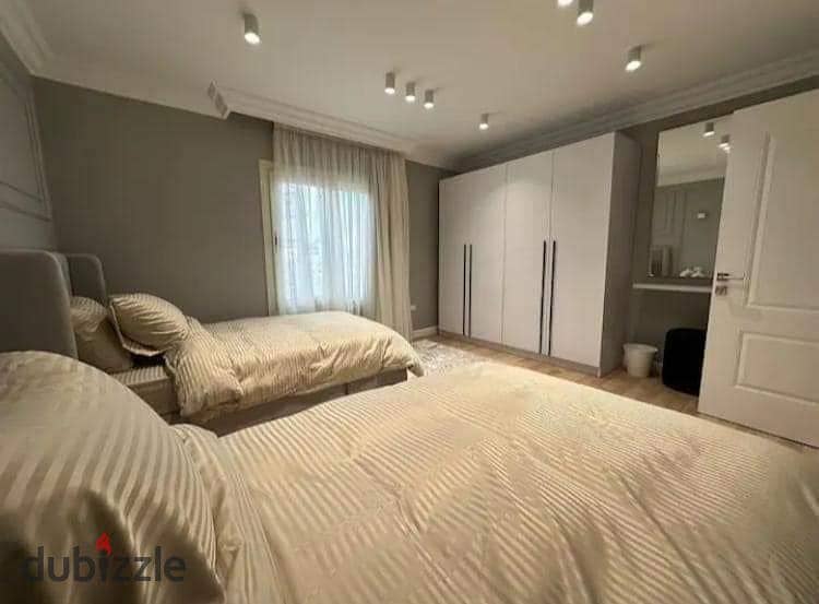 Apartment fully finished with air conditioning and kitchen, ready for immediate delivery and living, for sale in La Capital Compound in New Capital 3