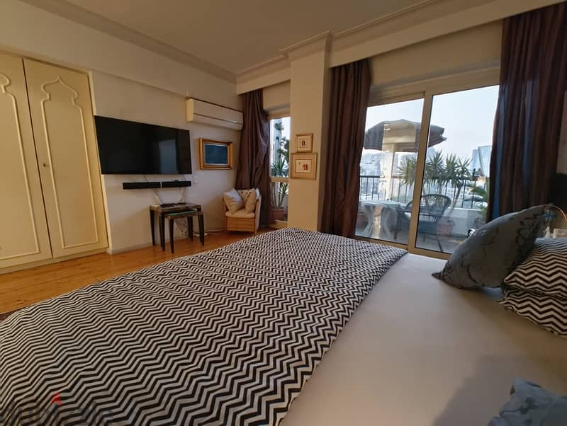 Duplex Haven with Panoramic Views at Mesaha Square, Dokki 7