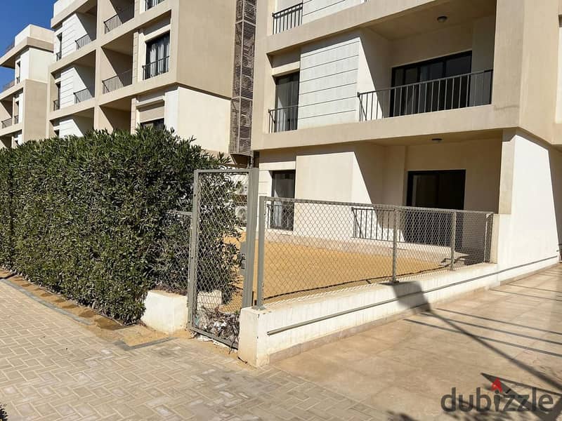 Apartment with garden under market price for sale in fifth square almarasem compound New Cairo fifth settlement 0