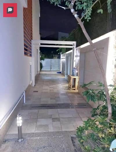 Apartment for sale, ground floor, garden, 3 rooms, in the Fifth Settlement, with a contract downpayment of 1,400,000, inside the Telal East Compound